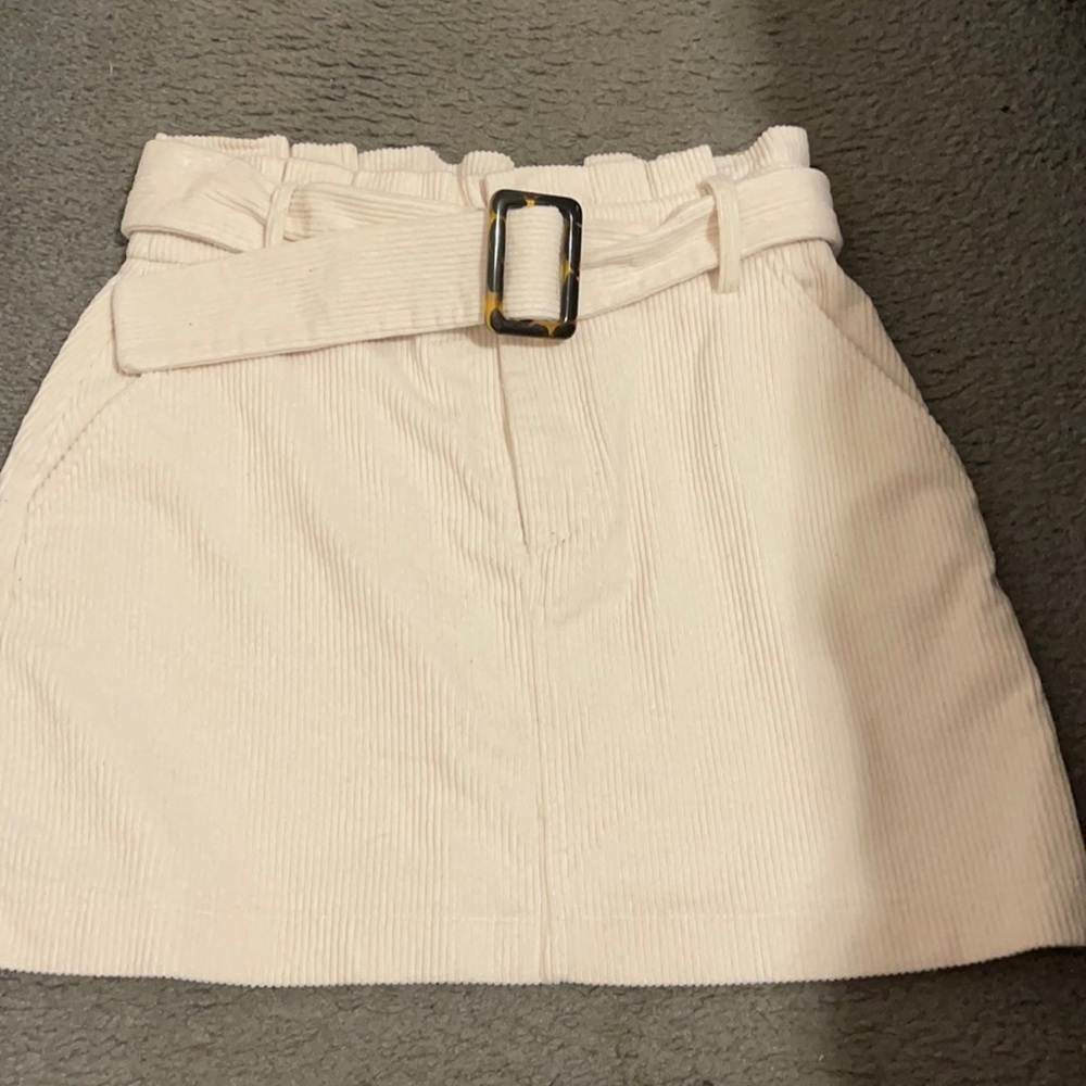 White belted corduroy skirt.